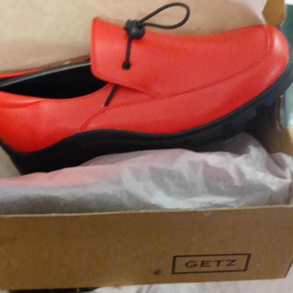 Red casual shoes.